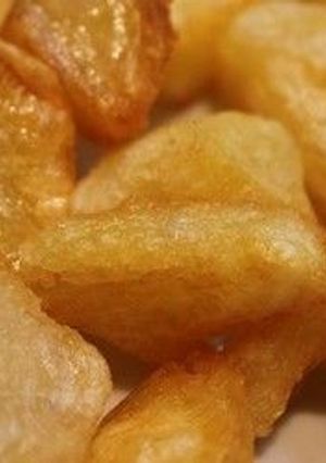 Una foto de Papas y batatas al infierno