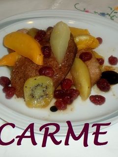 Una foto de Magret de pato con frutas confitadas