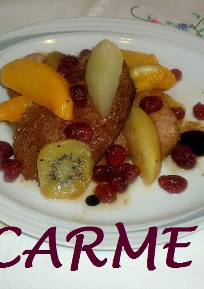 Una foto de Magret de pato con frutas confitadas