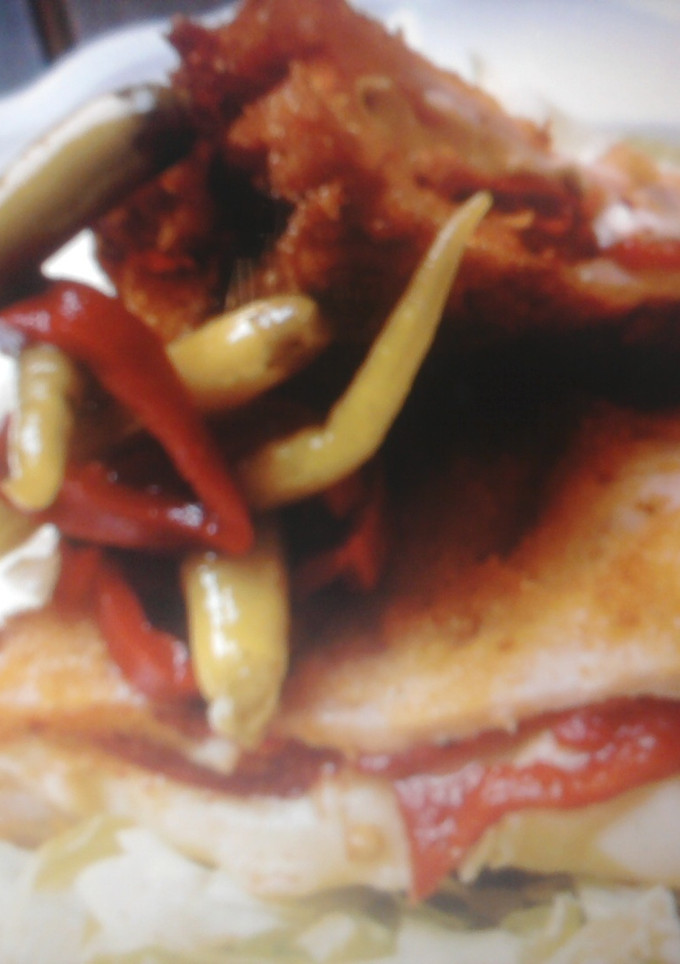 Una foto de San Jacobos de queso brie y pavo con piquillos