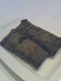 Pastel en hojas con guineos verdes (Juan)