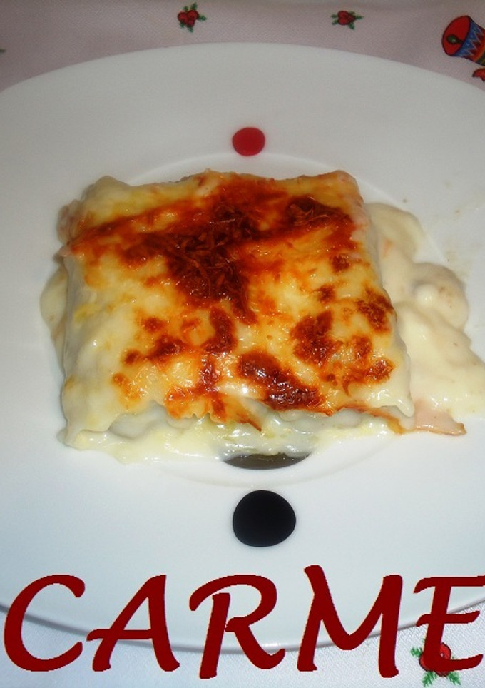 Una foto de Canelones trufados al jerez