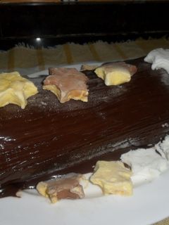 Una foto de Tronco navideño relleno de helado