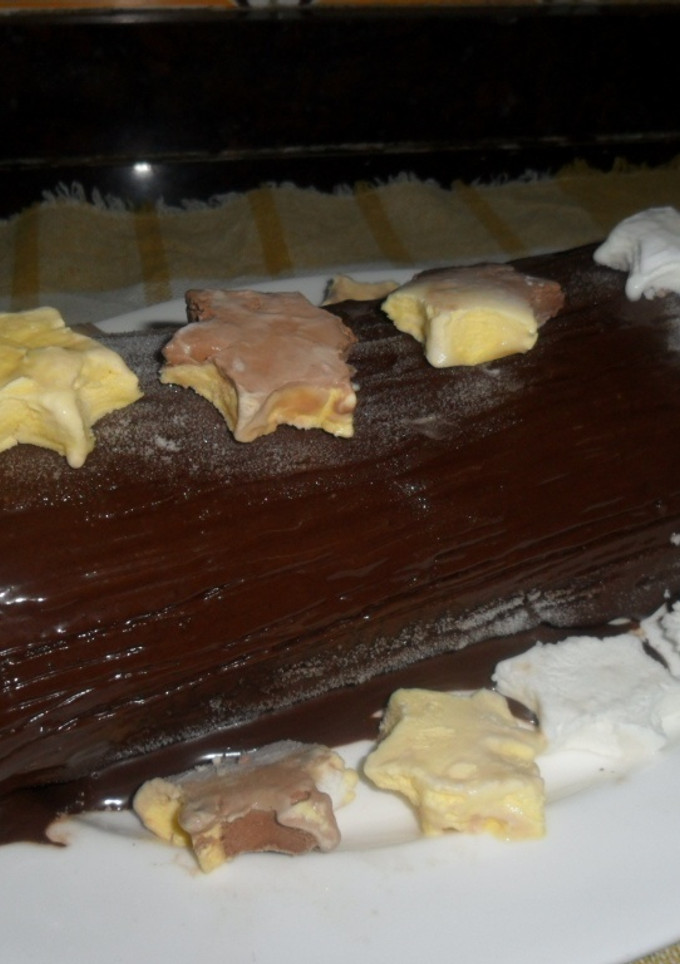 Una foto de Tronco navideño relleno de helado