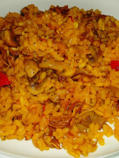 Una foto de Paella parellada