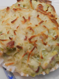 Una foto de Vieiras gratinadas con nata