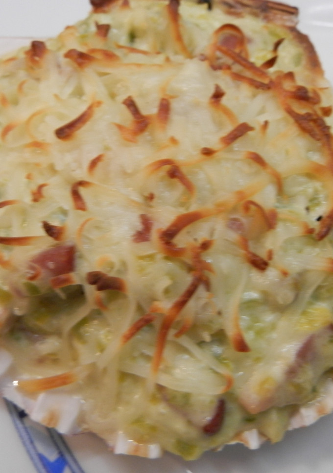 Una foto de Vieiras gratinadas con nata