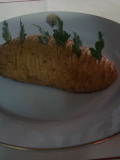 Una foto de Papas Hasselback