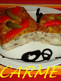 Una foto de Pastel de merluza y setas