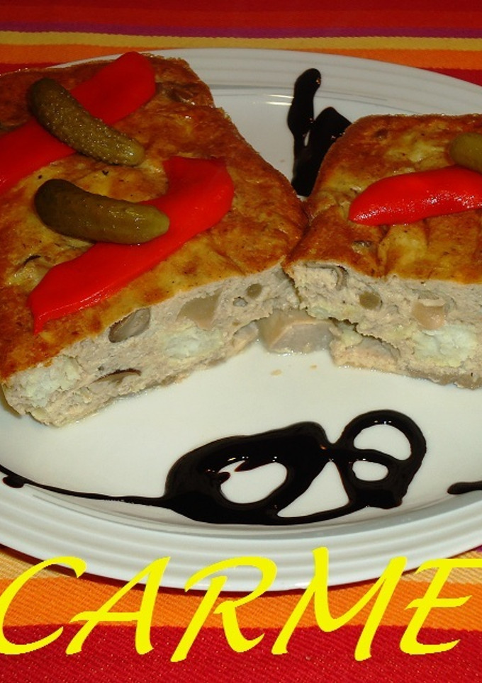 Una foto de Pastel de merluza y setas