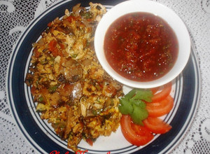 Una foto de Revoltijo de huevos con hongos a la mexicana (orgánicos)