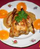 Picantones rellenos con salsa de naranja