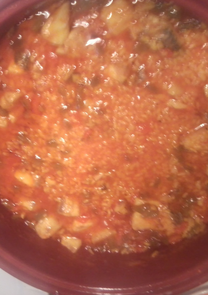 Una foto de Cazuela de arroz caldoso con corvina