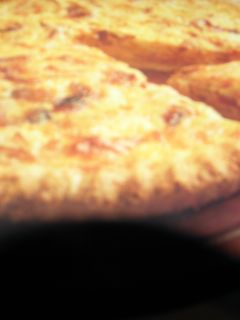 Una foto de Tarta cremosa de queso y panceta