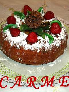 Una foto de Kougelhopf con frutas y nueces