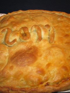 Una foto de Empanada de pisto y huevo duro