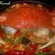Paella de Nochevieja con mariscos y curry