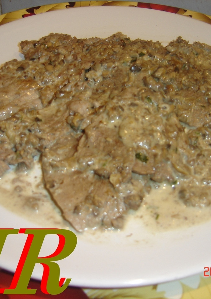 Una foto de Solomillo ibérico con salsa de champiñones
