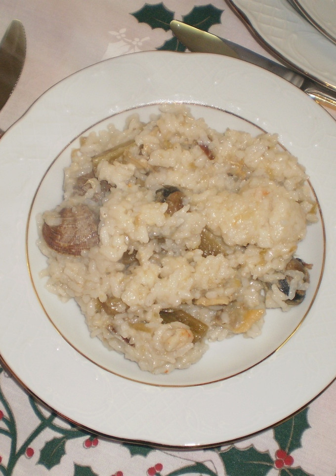 Una foto de Arroz caldoso con cardos y almejas