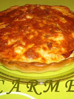 Una foto de Quiché de gambas, embutidos y piñones