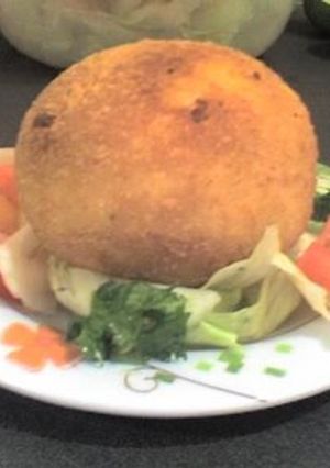 Una foto de Arancini o arancine