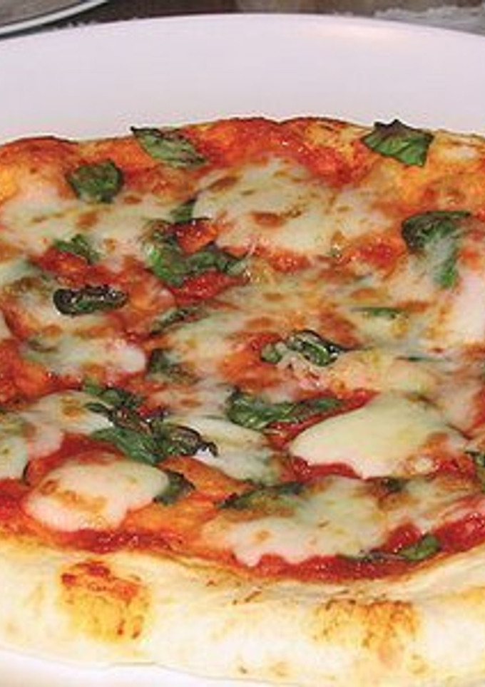 Una foto de Pizza Margarita a la italiana