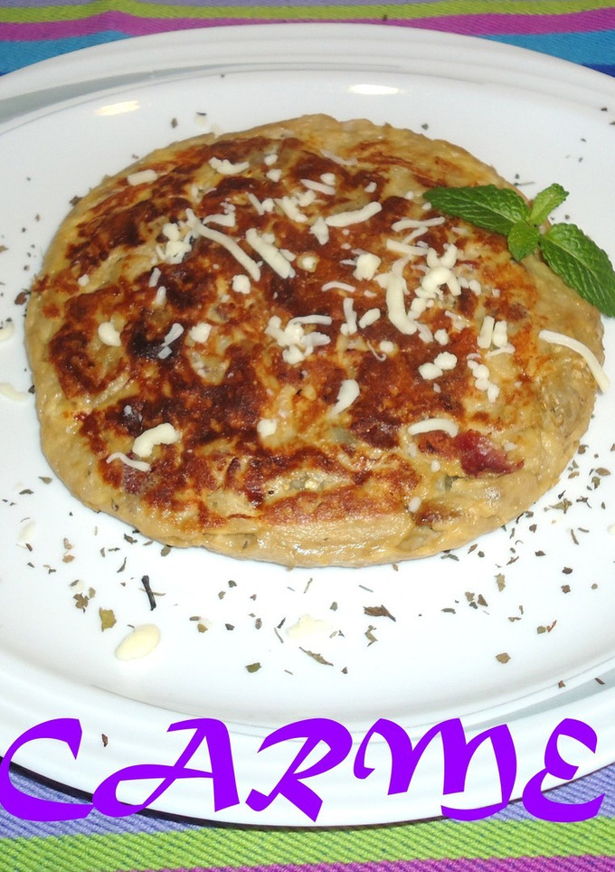 Una foto de Tortilla de berenjena blanca y jamón ibérico