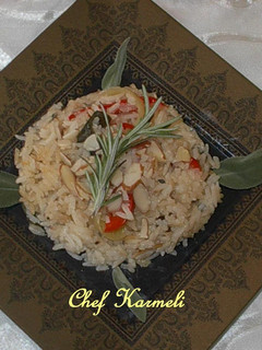 Una foto de Arroz almendrado con higos y pimientos