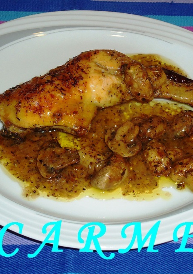 Una foto de Pollo asado con champiñones al cava y picantito