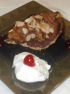 Una foto de Tarta vasca de higos y naranja con chocolate