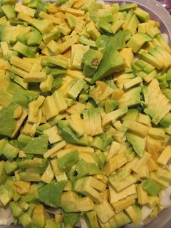 Una foto de Ensalada de lechuga, palmitos, manzana y palta