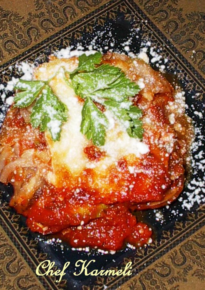 Una foto de Lasaña vegetariana orgánica con tinto