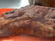 Una foto de cazuela de cabrito