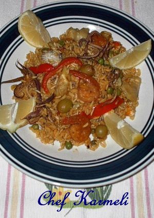 Una foto de Arroz integral orgánico con mariscos al txacolí