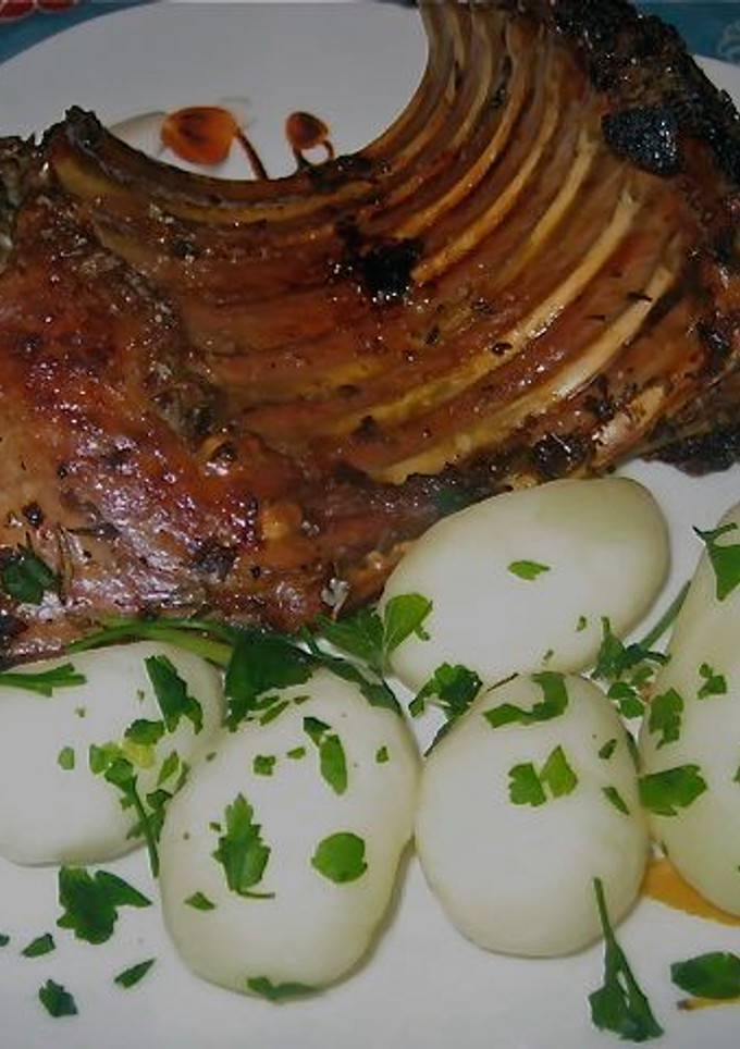 Una foto de Cochinillo al horno