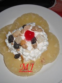 Una foto de Queso cottagge con piña y granola