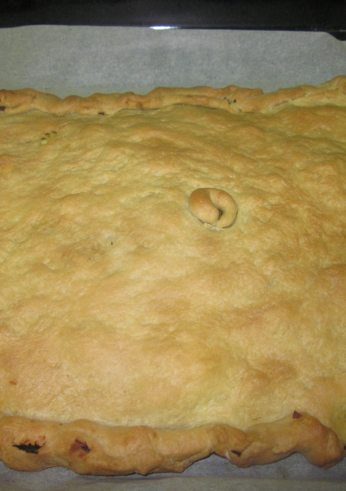 Una foto de Empanada con restos de cocido