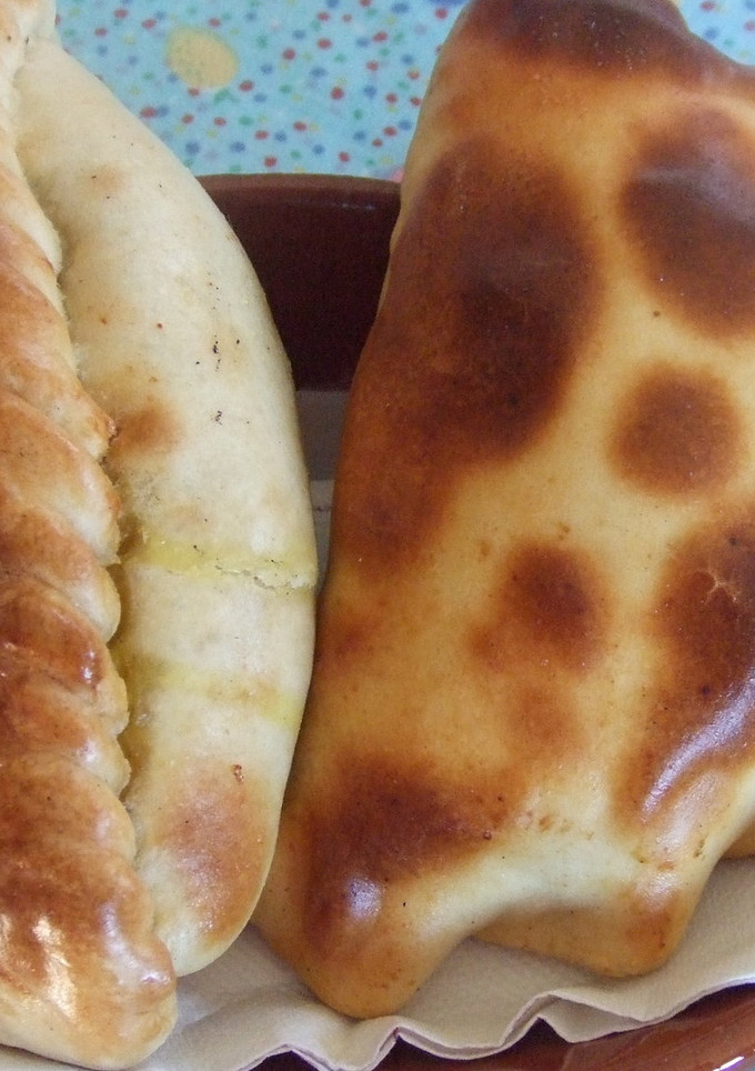 Una foto de Empanadas de cebollas y alcachofas