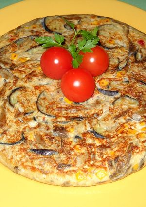Una foto de Tortilla de setas y hortalizas