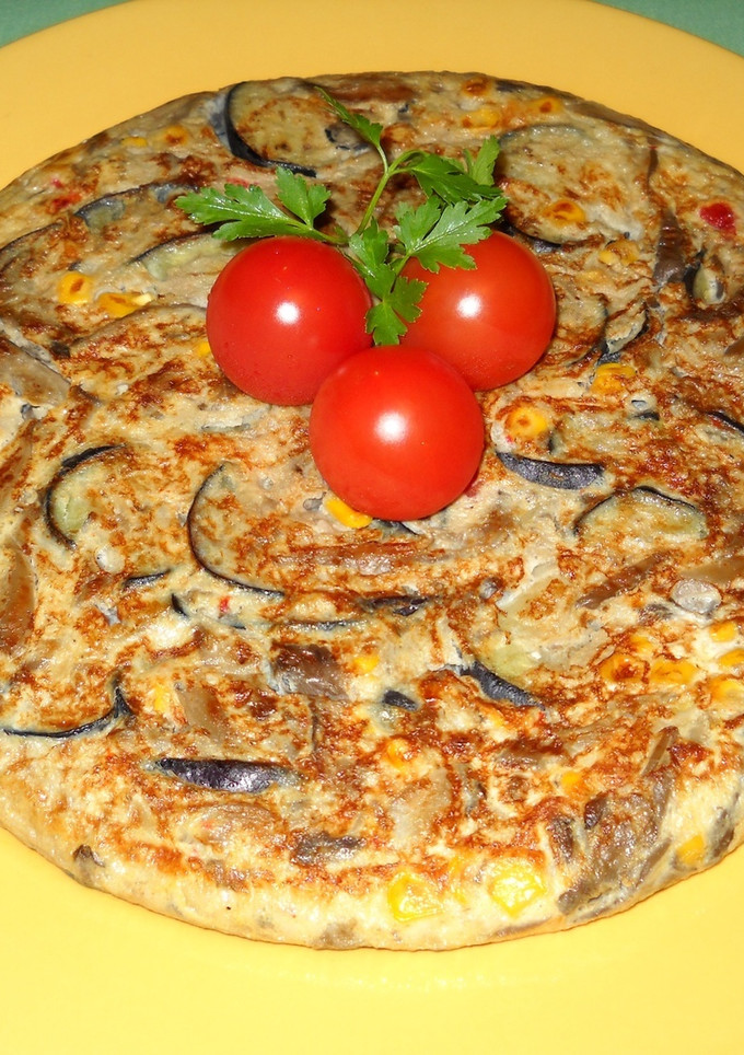 Una foto de Tortilla de setas y hortalizas