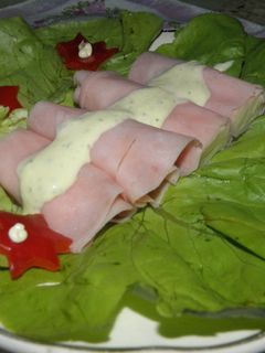 Una foto de Arrolladitos de jamón y pera