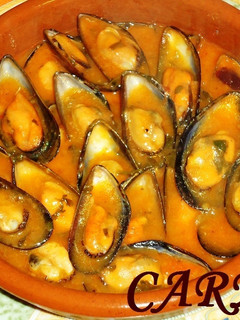 Una foto de Cazuela de mejillones con salsa
