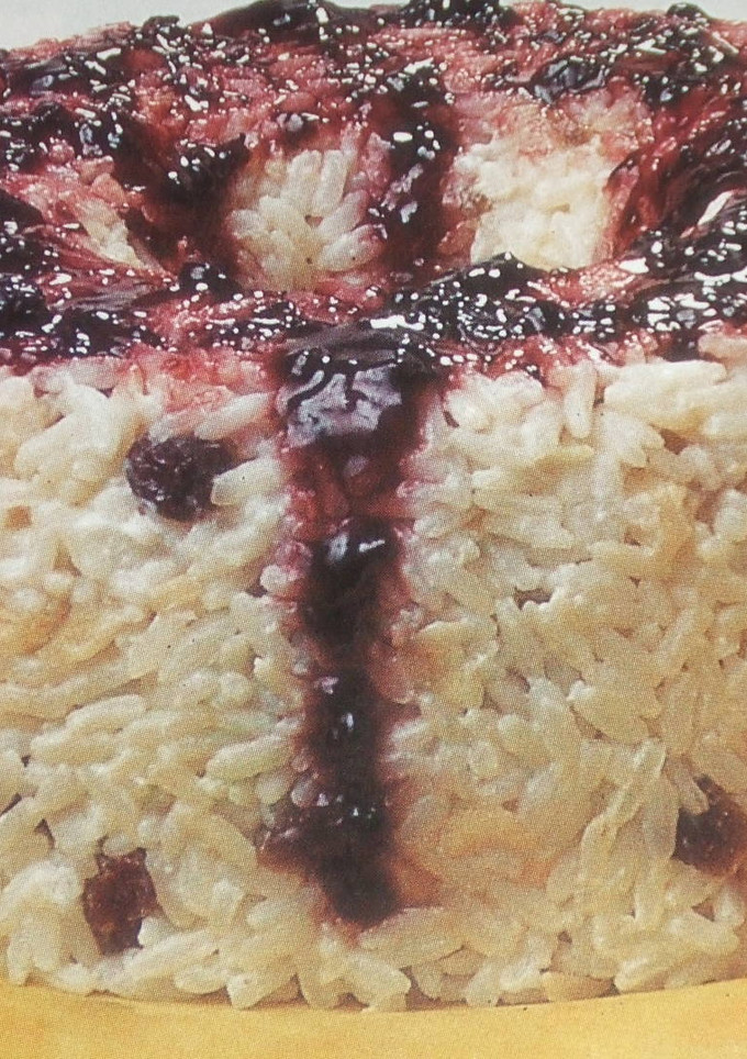 Una foto de Arroz frutal con mermelada de arándanos