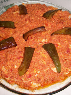 Una foto de Pollo con tomate al huevo
