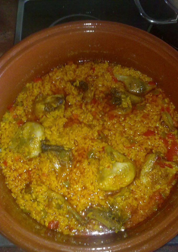 Una foto de Arroz bomba con codornices 