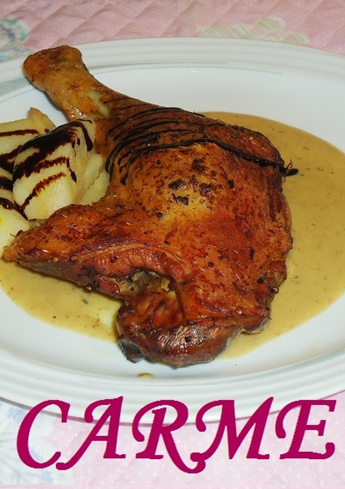 Una foto de Muslos de pato con salsa de peras