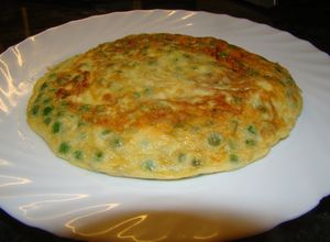 Una foto de Tortilla de guisantes congelados