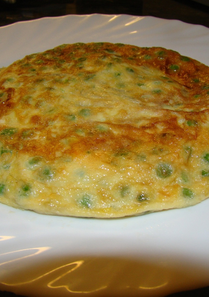 Una foto de Tortilla de guisantes congelados