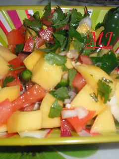 Una foto de Pico de gallo con mango