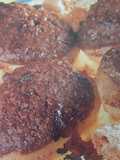 Melocotones con relleno de chocolate y amaretti